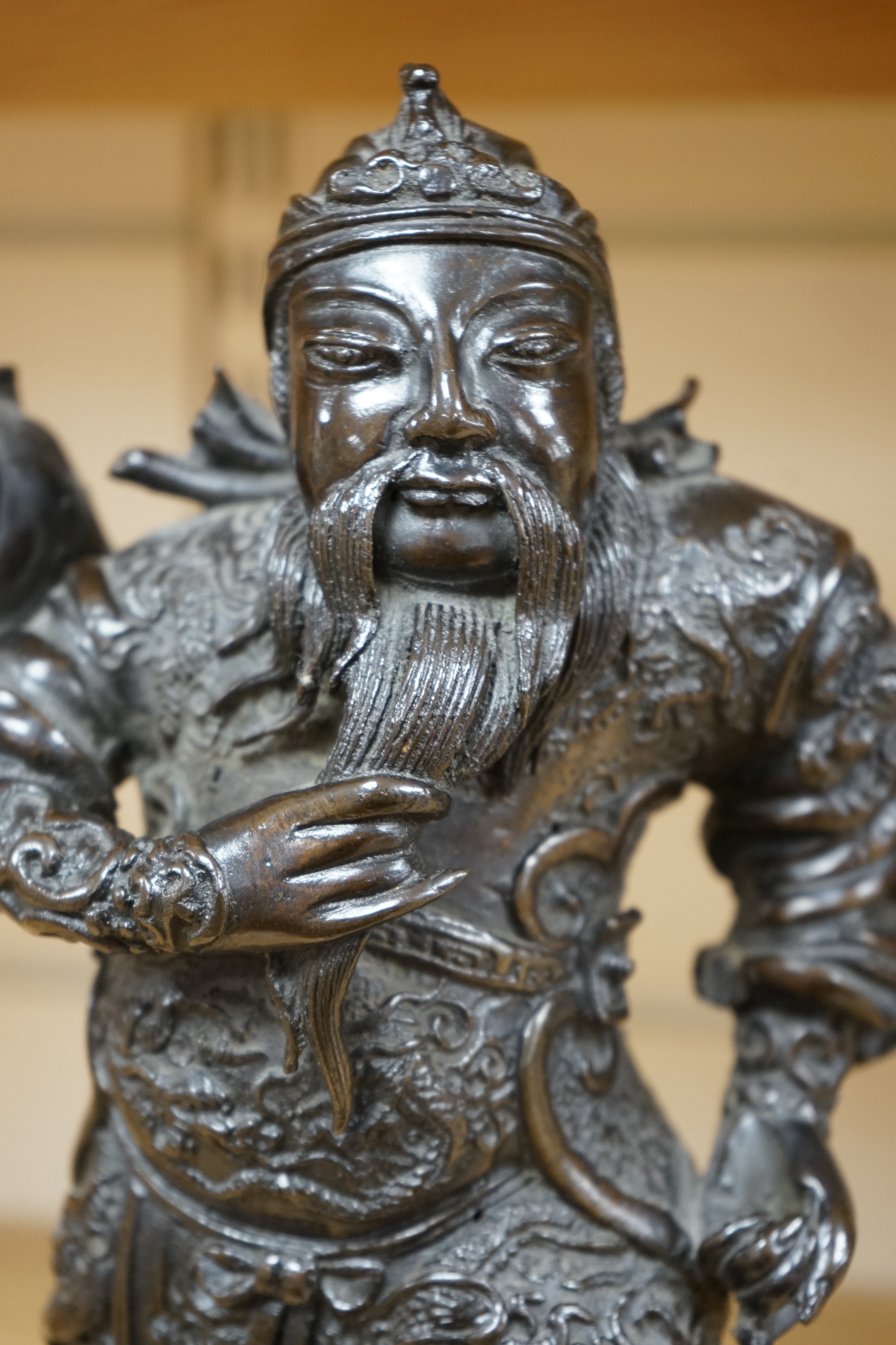 A 20th century Chinese bronze figure of Guan Yu, 29cm. Condition - fair to good